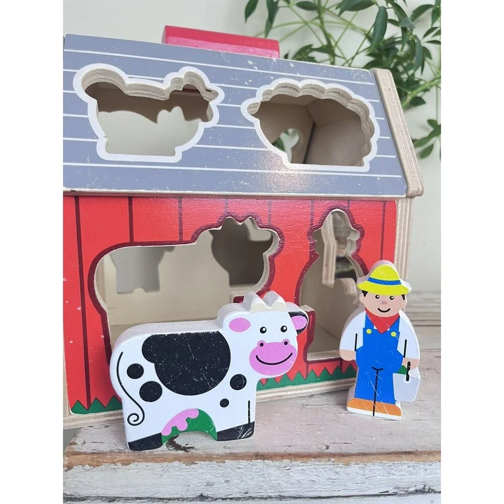 Melissa & Doug Wooden Take-Along Shape Sorting Barn with Flip-Up Roof 9 Figures